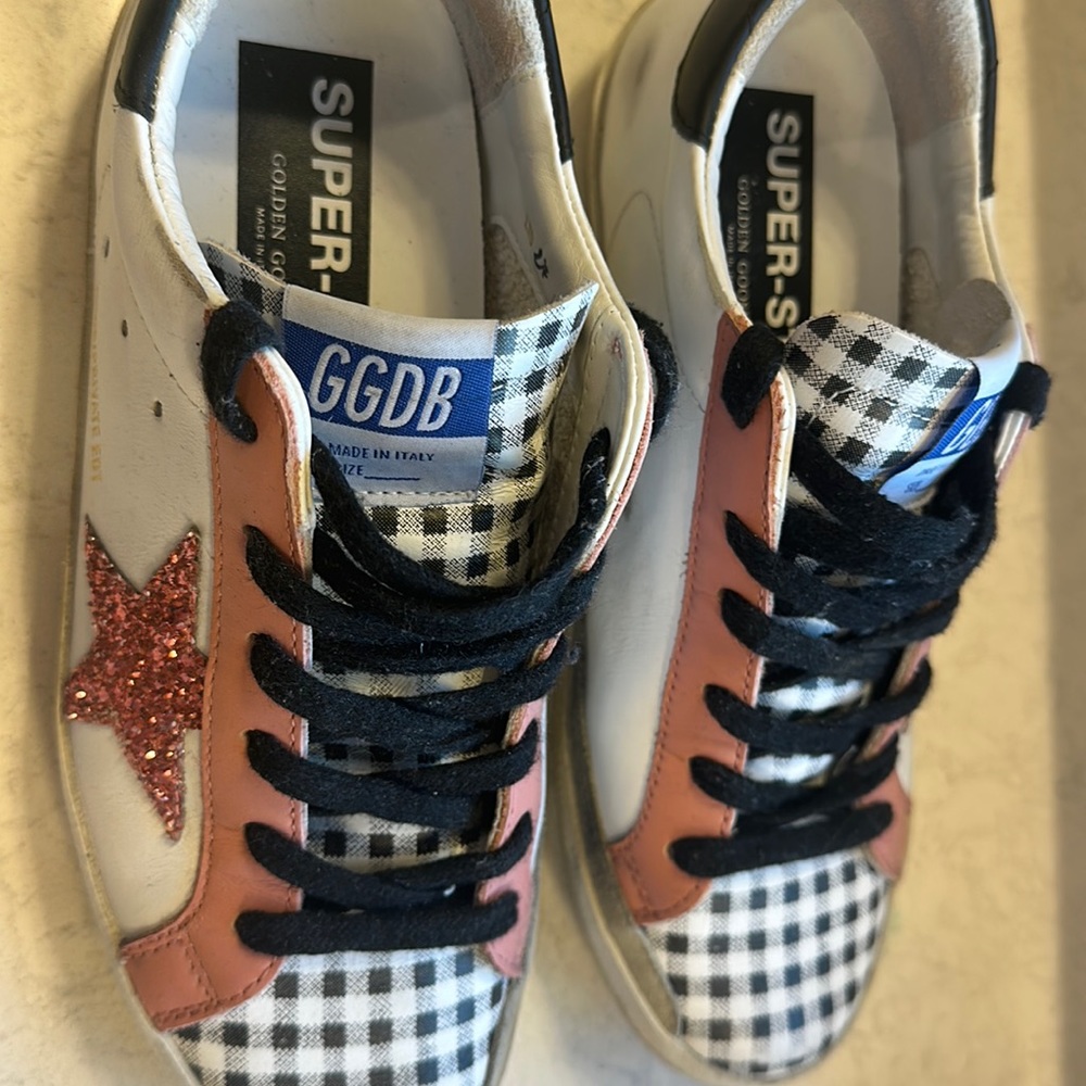 Golden goose exclusive superstars. Number 27/250.